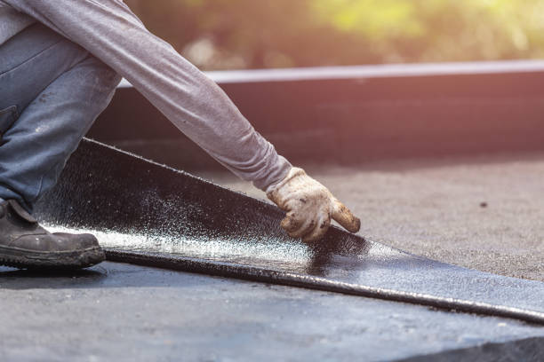 Professional Waterproofing technician working in Commack, NY
